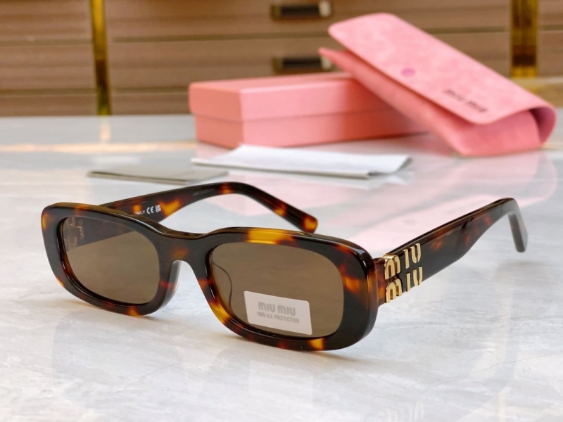 Miu miu Sunglasses